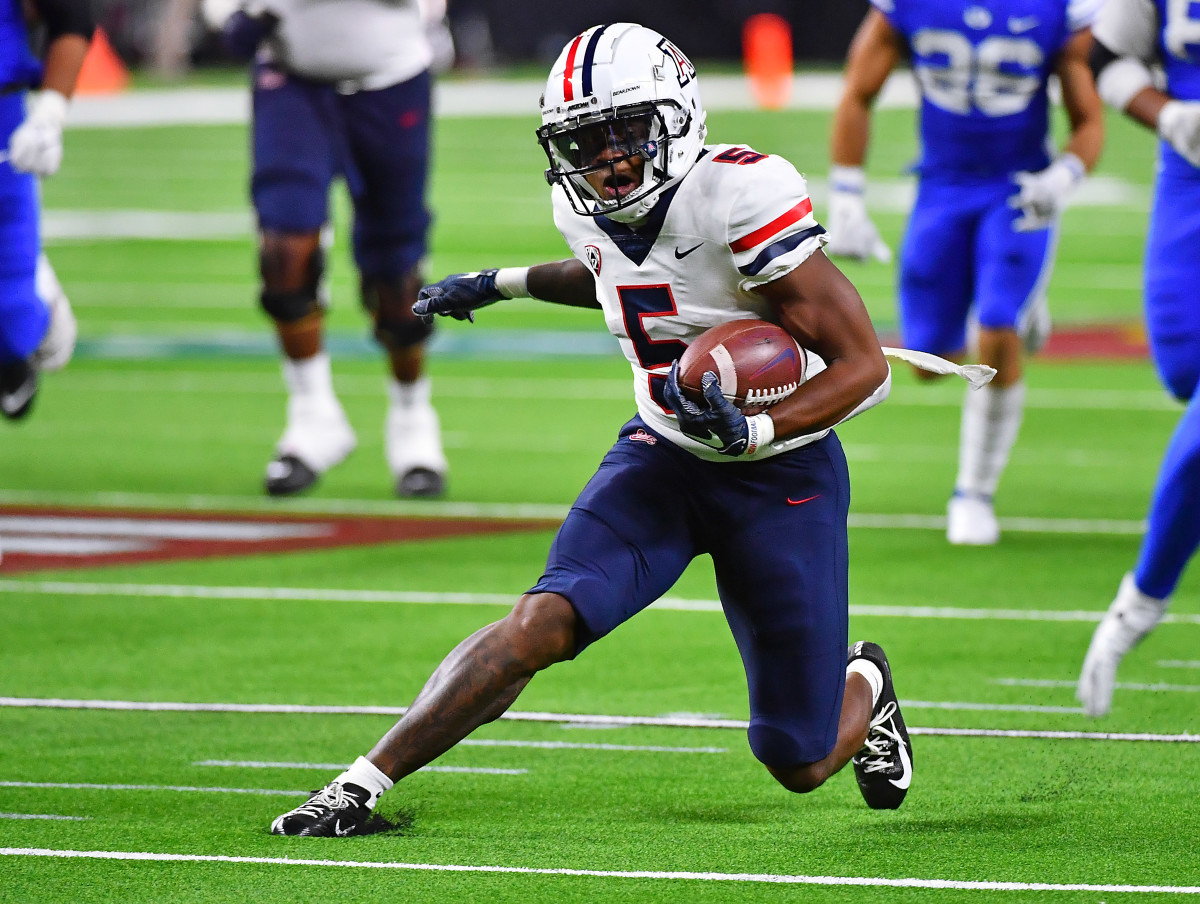 Arizona wide receiver BJ Casteel (5) jukes a defender.